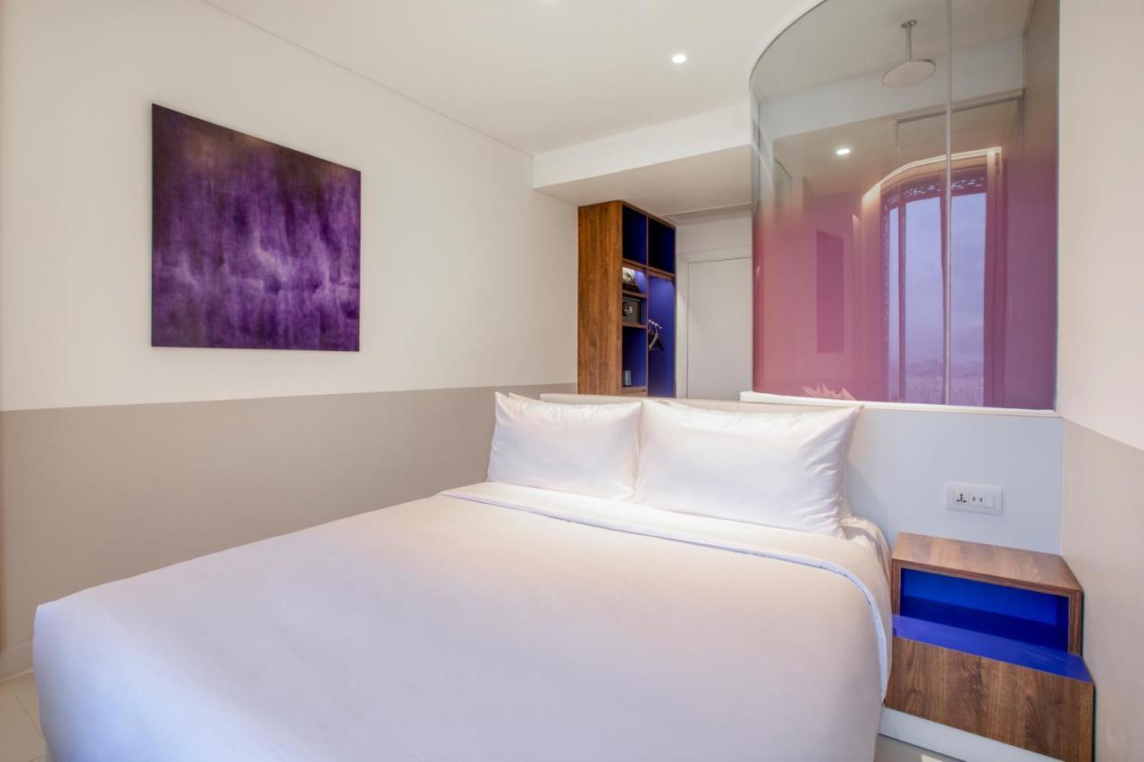 Wink Icon Hotel Danang Riverside - Luxury Suites - 24Hrs Stay & Rooftop Pool Bar Esterno foto