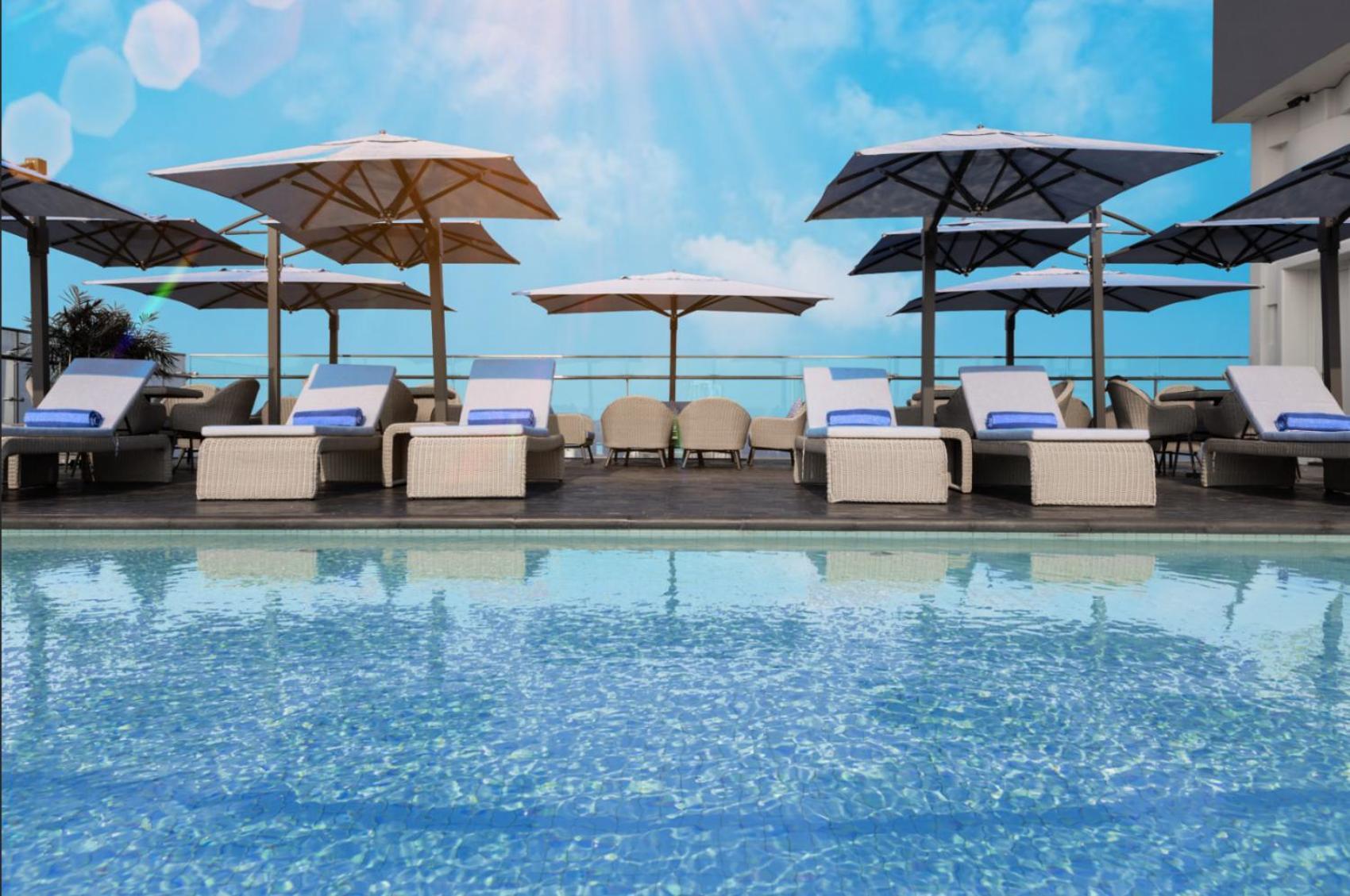 Wink Icon Hotel Danang Riverside - Luxury Suites - 24Hrs Stay & Rooftop Pool Bar Esterno foto
