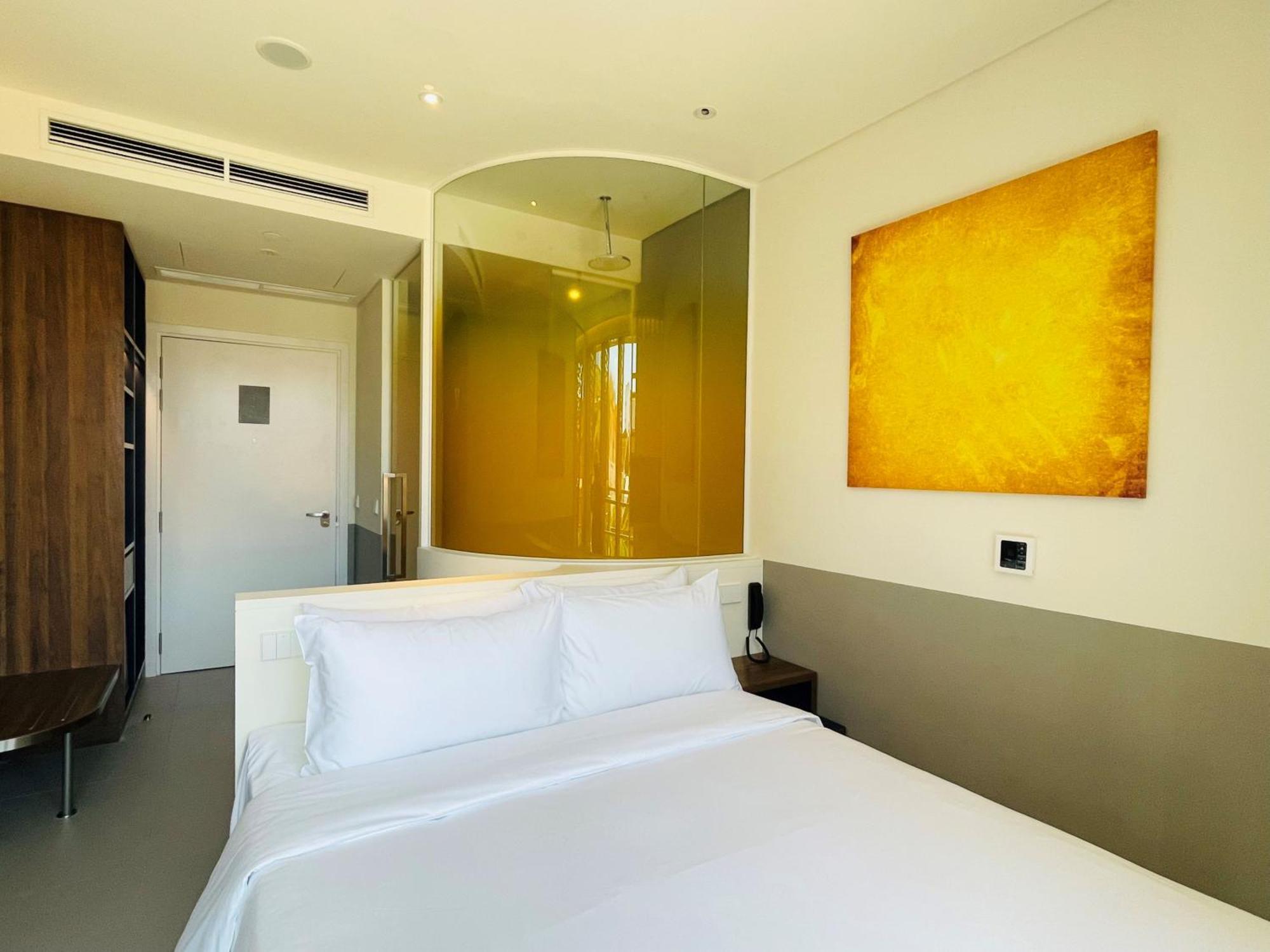 Wink Icon Hotel Danang Riverside - Luxury Suites - 24Hrs Stay & Rooftop Pool Bar Esterno foto